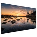 Obraz na płótnie - zachód słońca, woda, skały
