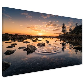 Obraz na płótnie - zachód słońca, woda, skały