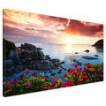 Obraz na płótnie - plaża, zachód słońca, kwiaty