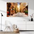 Obraz na płótnie - uliczka, kwiaty, budynki