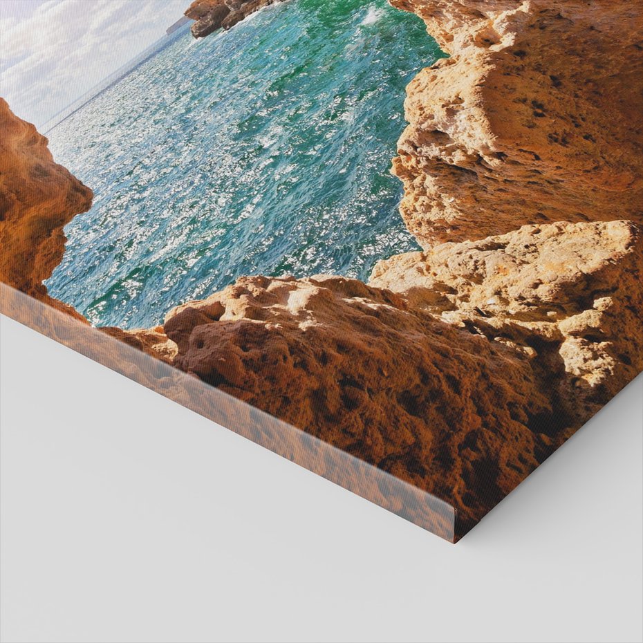 Obraz na płótnie - skały, morze, słońce